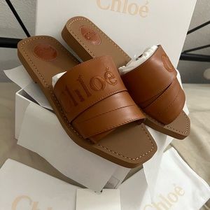 NEW in box. CHLOE leather cognac brown woody sandals